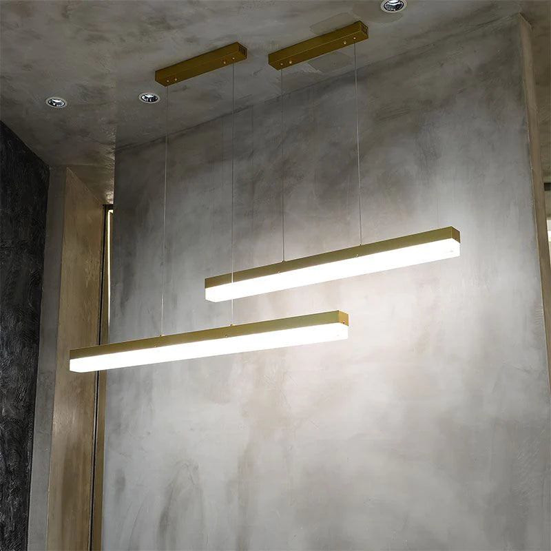Modern Minimalist Alabaster Linear Chandelier Over Kitchen Island