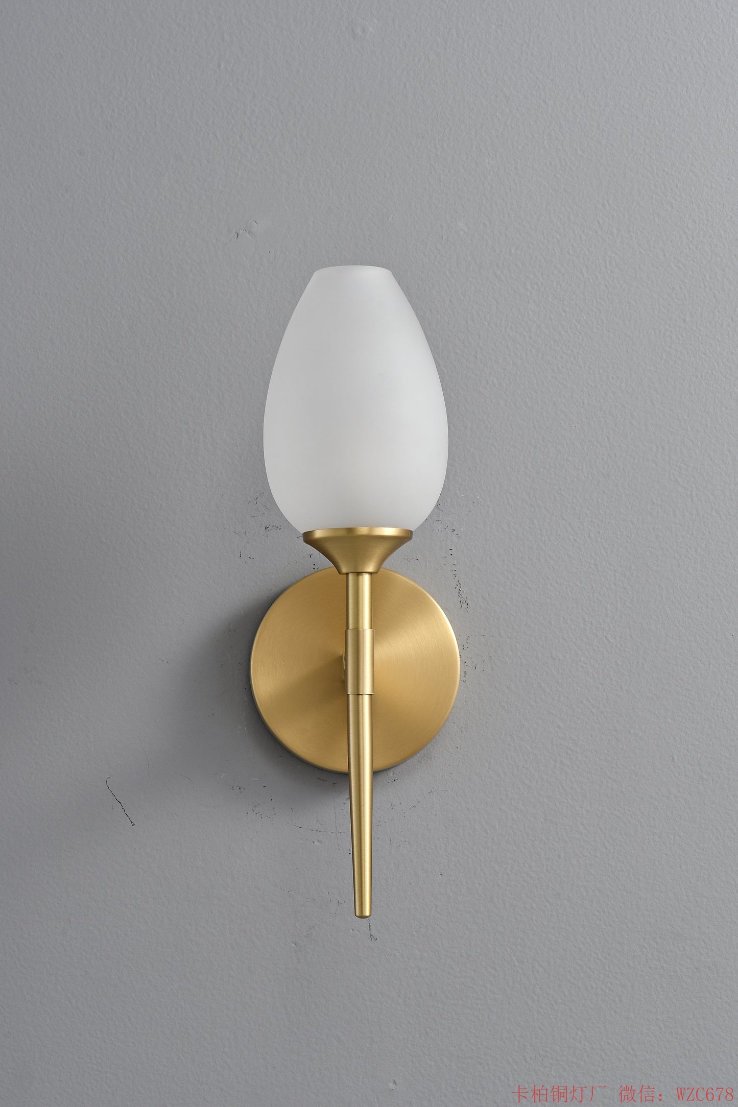 Simple Brass wall lighting fixture with glass bud shade