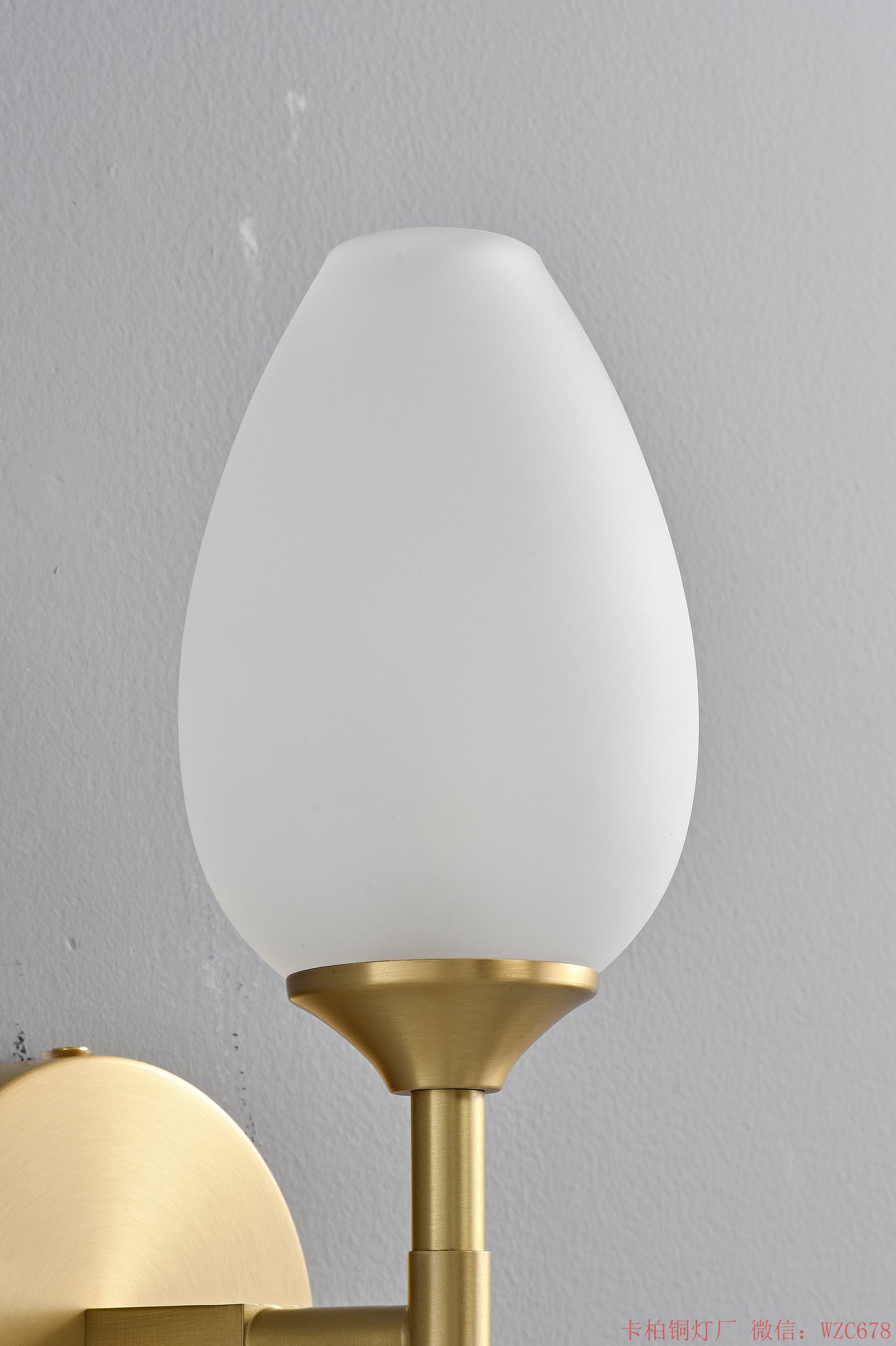 Simple Brass wall lighting fixture with glass bud shade