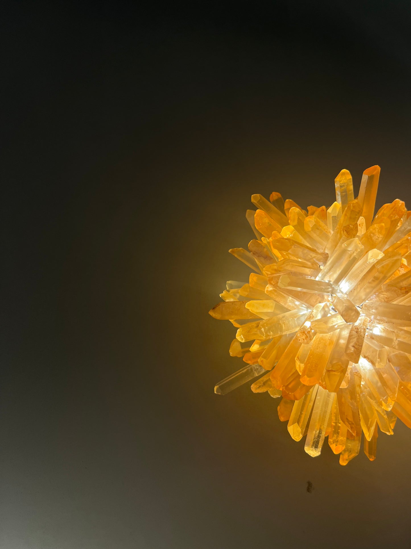 Amber color rock crystal wall sconce