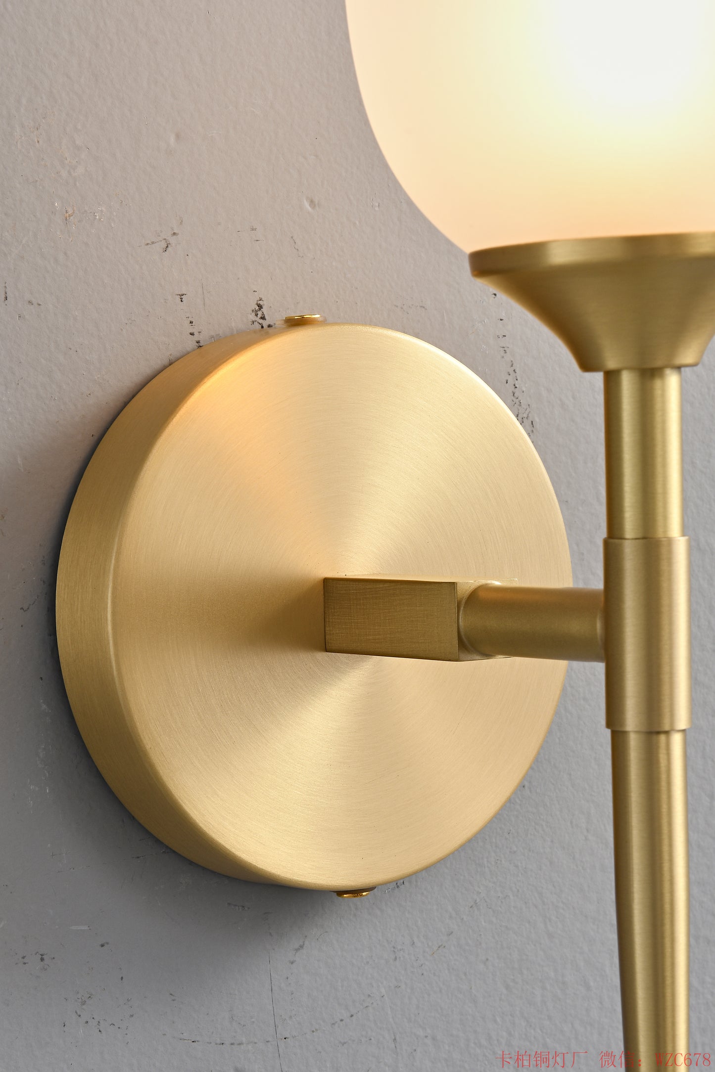 Simple Brass wall lighting fixture with glass bud shade
